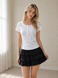 Everyday Essential Henley Tee styled with black skirt